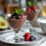 Delicious avocado chocolate mousse served in elegant glasses, perfect for a healthy dessert option.