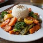 Deliciously plated ninja combi meal featuring vibrant stir-fried vegetables and rice, showcasing the artistry of ninja combi recipes.